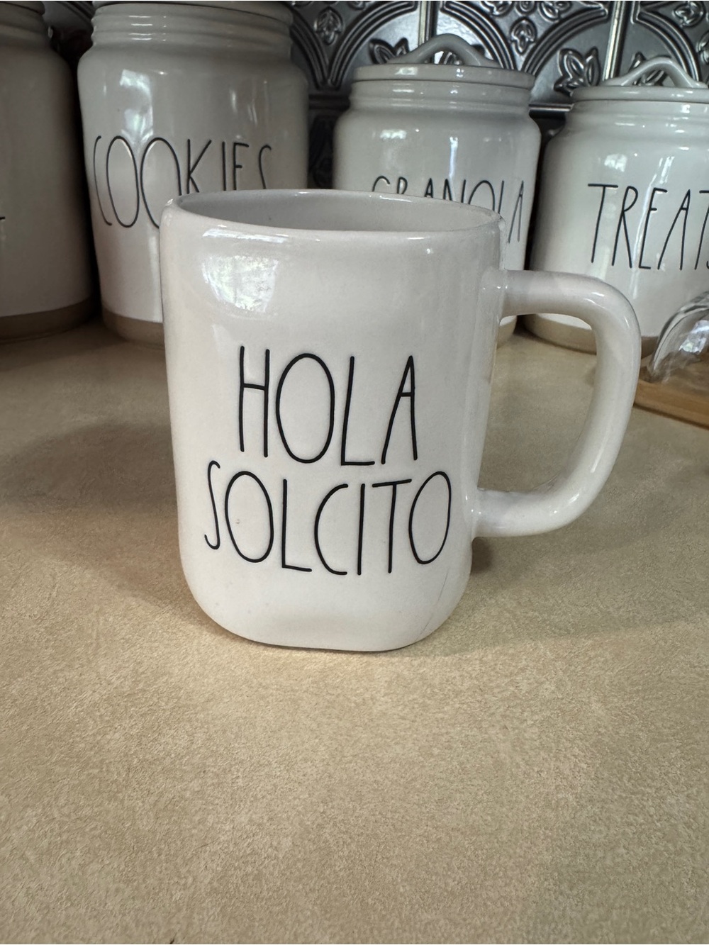 Rae Dunn Cream Ceramic Mug with Black 'HOLA SOLCITO' Lettering *cracked*